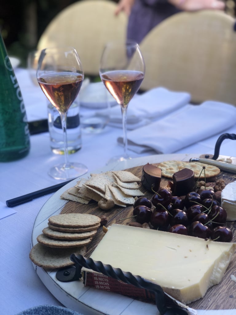 glassses of champagne and cheese platter