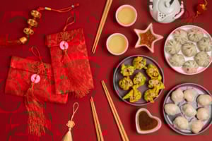 Traditional dumplings and sweet rice cake served for Lunar New Year celebration