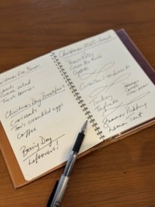 Hermès leather notebook with handwritten menu and dish prep notes for effortless entertaining