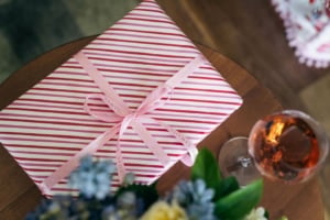 Celebrating Champagne: A Wine For All Seasons by Sally Hillman wrapped as a Christmas gift