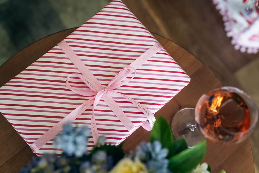 Celebrating Champagne: A Wine For All Seasons by Sally Hillman wrapped as a Christmas gift