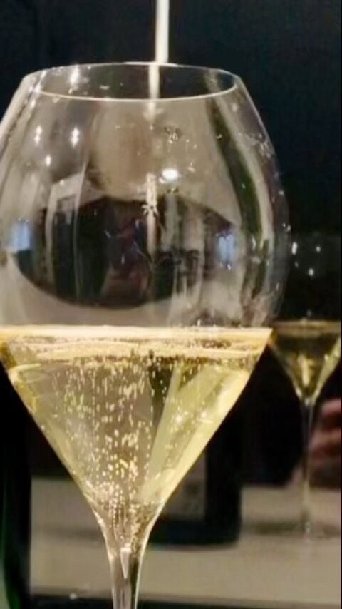 There’s nothing quite as mesmerising as watching a million tiny bubbles rise up in a glass of champagne, is there? 🥂
 
But have you ever wondered why these exquisite golden bubbles rise up, single-file, in such a steady, straight line? 🫧 Thanks to researchers from Brown University and the University of Toulouse, champagne and sparkling wine lovers now understand the science behind the signature effervescence of their favourite bottle of bubbly.
 
Unlike the bubbles in beer and soda, which tend to veer off sideways when rising, giving the appearance of multiple bubbles rising simultaneously, the gas bubbles in champagne and sparkling wines rise in a single straight line, forming what is known as a stable bubble chain.
 
In a recent study published in Physical Review Fluids, researchers investigated the conditions for bubble chain stability and found that the presence of surfactant molecules in sparkling wines ‘attach to the bubble surface, [inducing] changes in [their] wake which, in turn, cause the bubbles to not be knocked out from the in-line configuration’. Elaborating further, Roberto Zenit, the paper’s senior author, said: ‘The theory is that in champagne these contaminants that act as surfactants are the good stuff. These protein molecules that give flavour and uniqueness to the liquid are what makes the bubbles chains they produce stable’. The experiments also showed that in other liquids, even those without surfactant molecules, larger bubbles tend to form stabler chains like in champagne.
 
So there you have it, the quintessential fizzical attraction of champagne, explained!
 
Now then, who’s thirsty? 🍾
 
#SallyHillman #CelebratingChampagne
#champagne #wine #champagnelover #winelover #growerchampagne #recoltantmanipulant #wineeducation #experience #celebration #champagnetour #champagnetasting #winetasting #champagnetime #champagnemoments