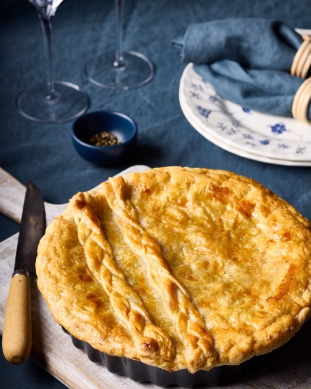 Hostess Notes | Spring Weather

Spring is keeping us on our toes. One day calls for lunch in the garden, the next for something warm from the oven.

My Chicken and Leek Pie is just the thing for this changeable weather. Tender chicken and sweet leeks tucked into a rich, creamy filling beneath a buttery crust. It has all the comforting appeal of a country kitchen in rural France, and is lovely served warm with a seasonal green salad.

You’ll find the recipe on page 79 of Celebrating Champagne: A Wine For All Seasons.

And for those empty tulip glasses, in the spirit of the book, I’d pour a Pinot noir-dominant champagne blend. Its red fruit flavours and cleansing citrus acidity provide just the right balance to the richness of the pie.

A little French comfort, whatever the weather.

#HostessNotes #sallyhillman #celebratingchampagne #spring #entertainingathome