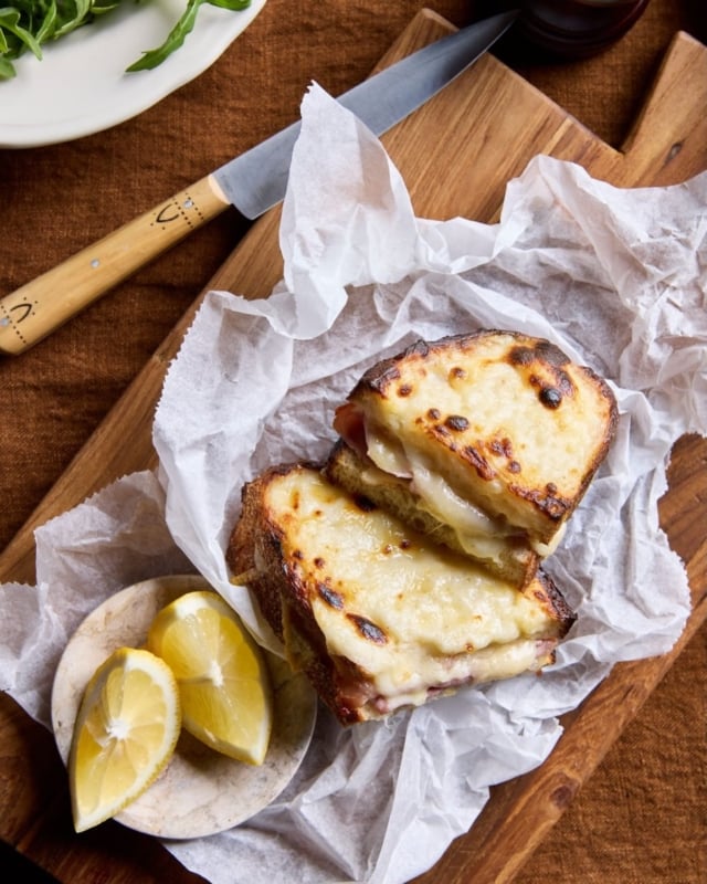 The Croque Monsieur is, at heart, a sandwich. But in true French fashion, it is also a moment.

Born in the cafés of Paris, it begins simply. Bread, butter, ham, Gruyère. Then comes the béchamel; silken, indulgent, and entirely transformative.

The name itself is a small piece of theatre. ‘Croque’ for crunch, ‘Monsieur’ for gentleman. The “crispy gentleman.” One imagines him well dressed, slightly charming, never trying too hard.

It feels especially at home in autumn. When the air cools and the table calls for something richer, more comforting. The kind of dish that invites deeper, fuller champagne - styles with body and quiet intensity, where Pinot noir and Meunier bring warmth and depth, and bright acidity cuts effortlessly through every golden, bubbling bite.

Considered, comforting, and just indulgent enough for the season.

For those curious to explore these pairings further, there is always more to discover within the pages of the book 🔗

📸 @bonniesavage @deborahkaloperfoodstylist 

#croquemonsieur #celebratingchampagne #autumnfood #frenchcuisine #foodandwinepairing